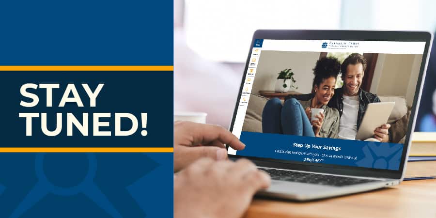 The new website on a laptop. The words at the left: stay tuned!