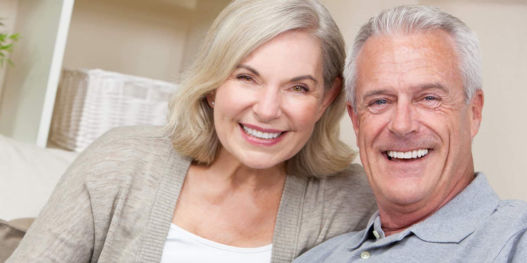 A smiling senior couple.